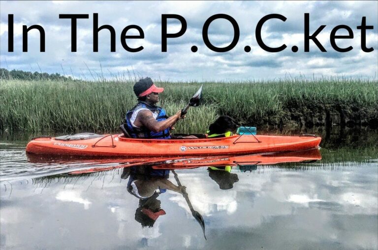 A Black woman paddles while sitting in a kayak on the water. Overlayed text reads "In The Pocket" with periods after the p, o, and c to represent the abbreviation for People of Color.