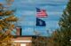 Flags fly over the University of Maine at Machias campus