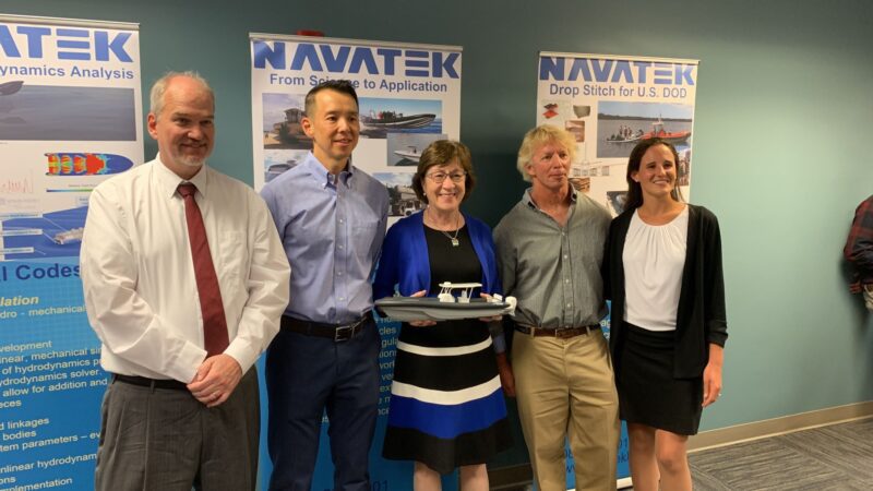 Senator Susan Collins poses for a group photo with Martin Kao and three other individuals.