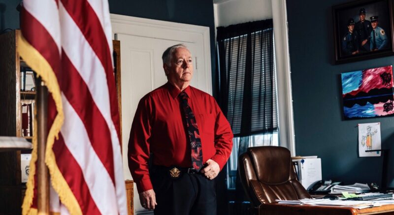 Sheriff Barry Curtis poses for a photo in his office.