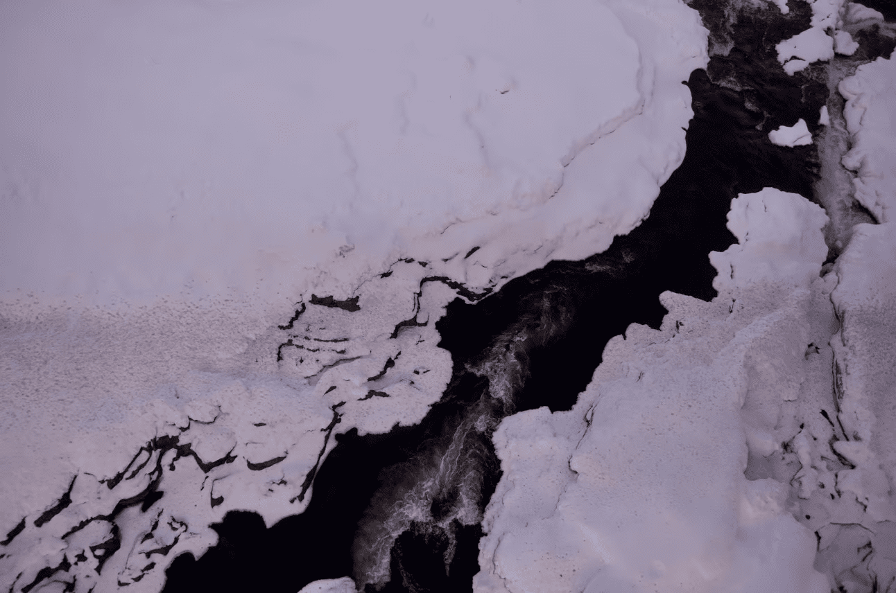 An aerial view of the Ellis River during the winter.