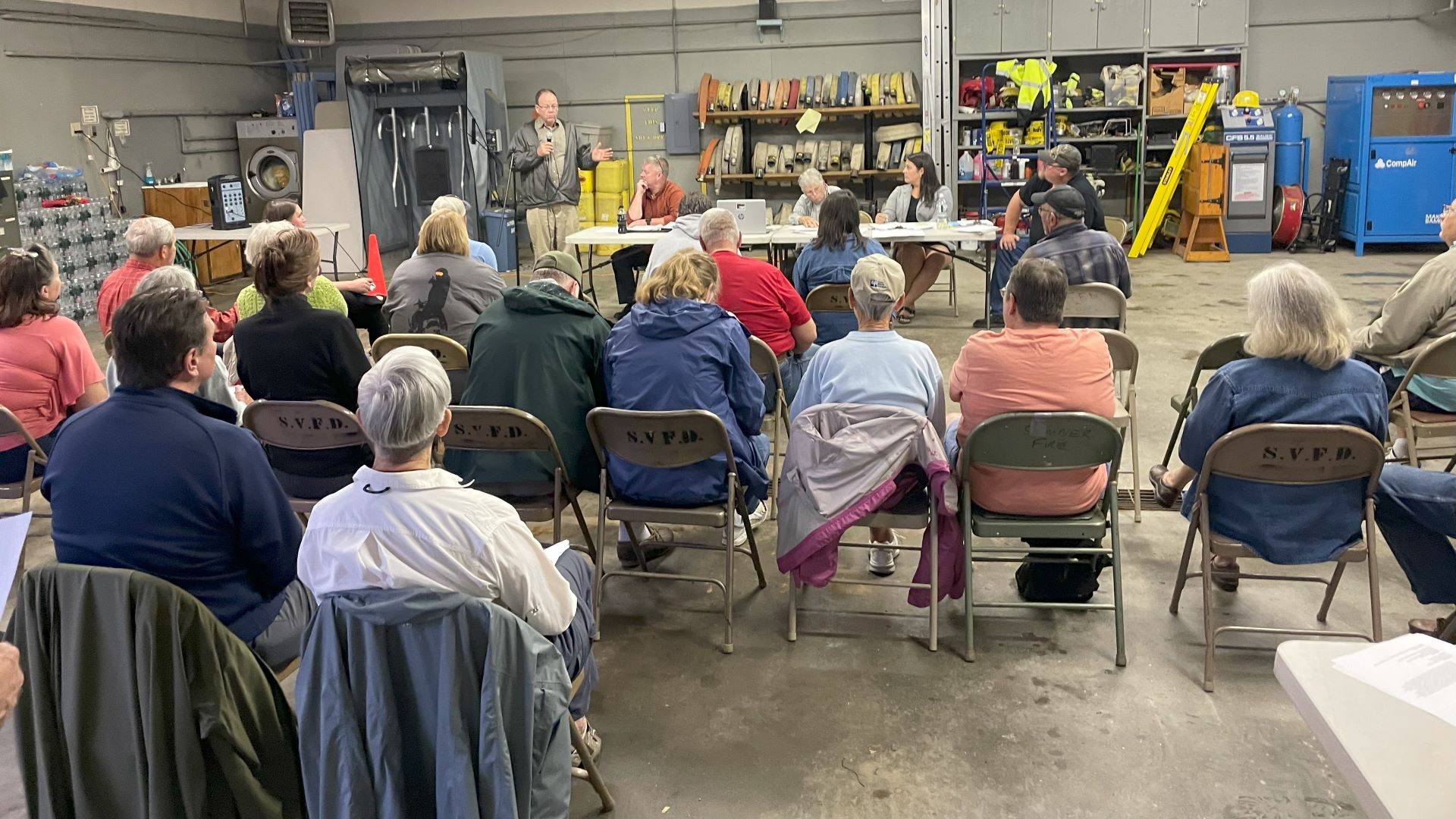 Residents gather during a meeting about the Sumner fire department.