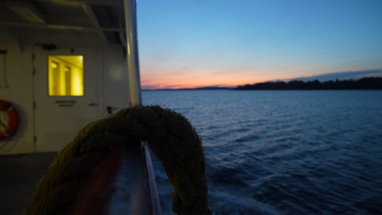 Sunrise on Casco Bay as seen from a boat.