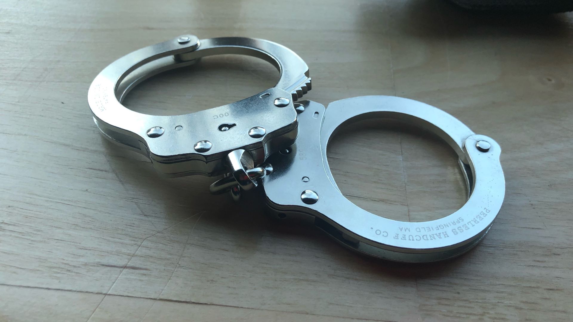 Handcuffs sit on a table