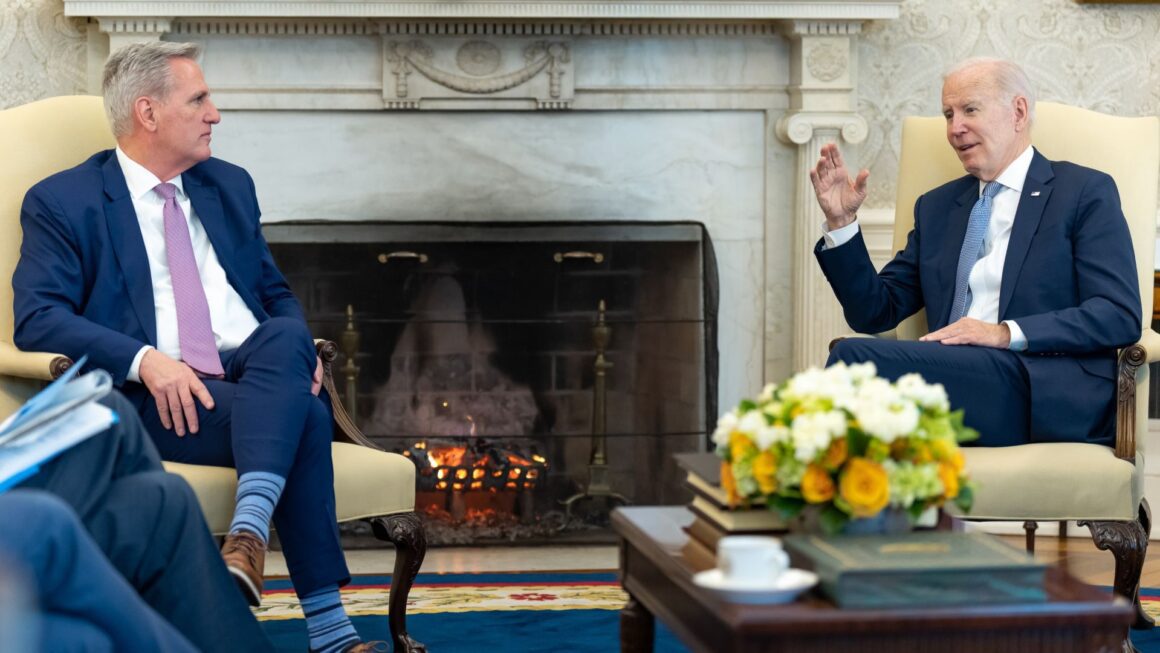Kevin McCarthy sits in the White House with President Joe Biden.