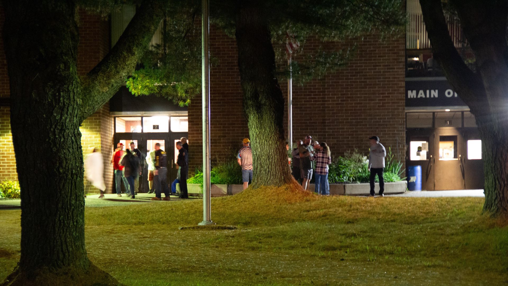 People gather at the reunification center in Auburn.