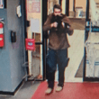 Lewiston mass shooting suspect seen in a still from surveillance footage.