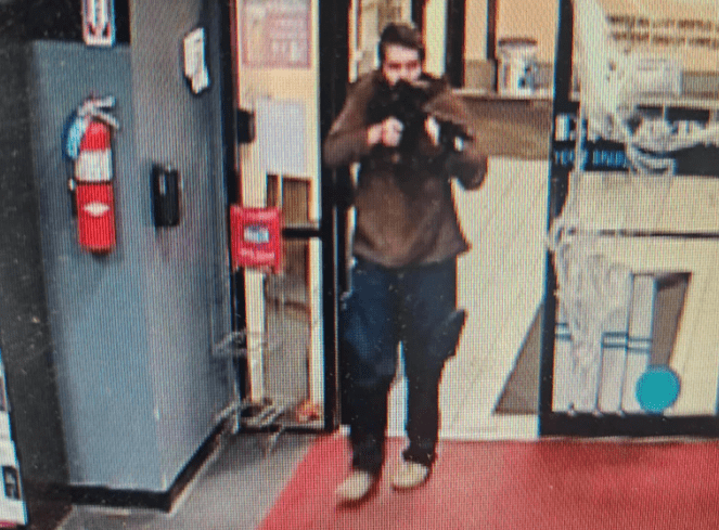Lewiston mass shooting suspect seen in a still from surveillance footage.