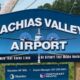 A property identification sign at the entrance of the Machias Valley Airport.
