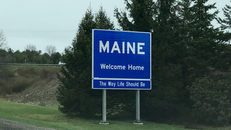 A blue sign along the Maine Turnpike in Kittery reads: "Maine. Welcome Home. The way life should be."