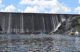 A hydroelectric dam as seen from the river.