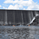 A hydroelectric dam as seen from the river.