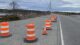 Orange traffic cones line Route 1 in Machias.