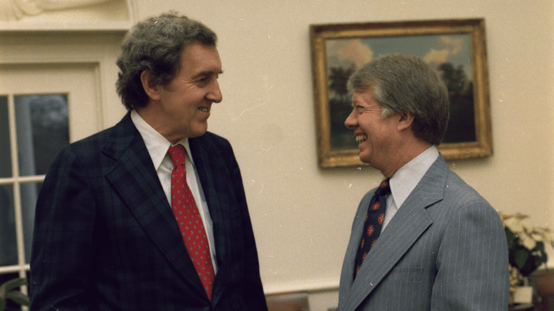 Senator Edmund Muskie chatting with President Jimmy Carter.