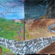 A banner created by students that features the two paths: climate justice and climate chaos.