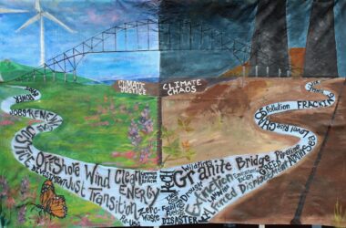A banner created by students that features the two paths: climate justice and climate chaos.