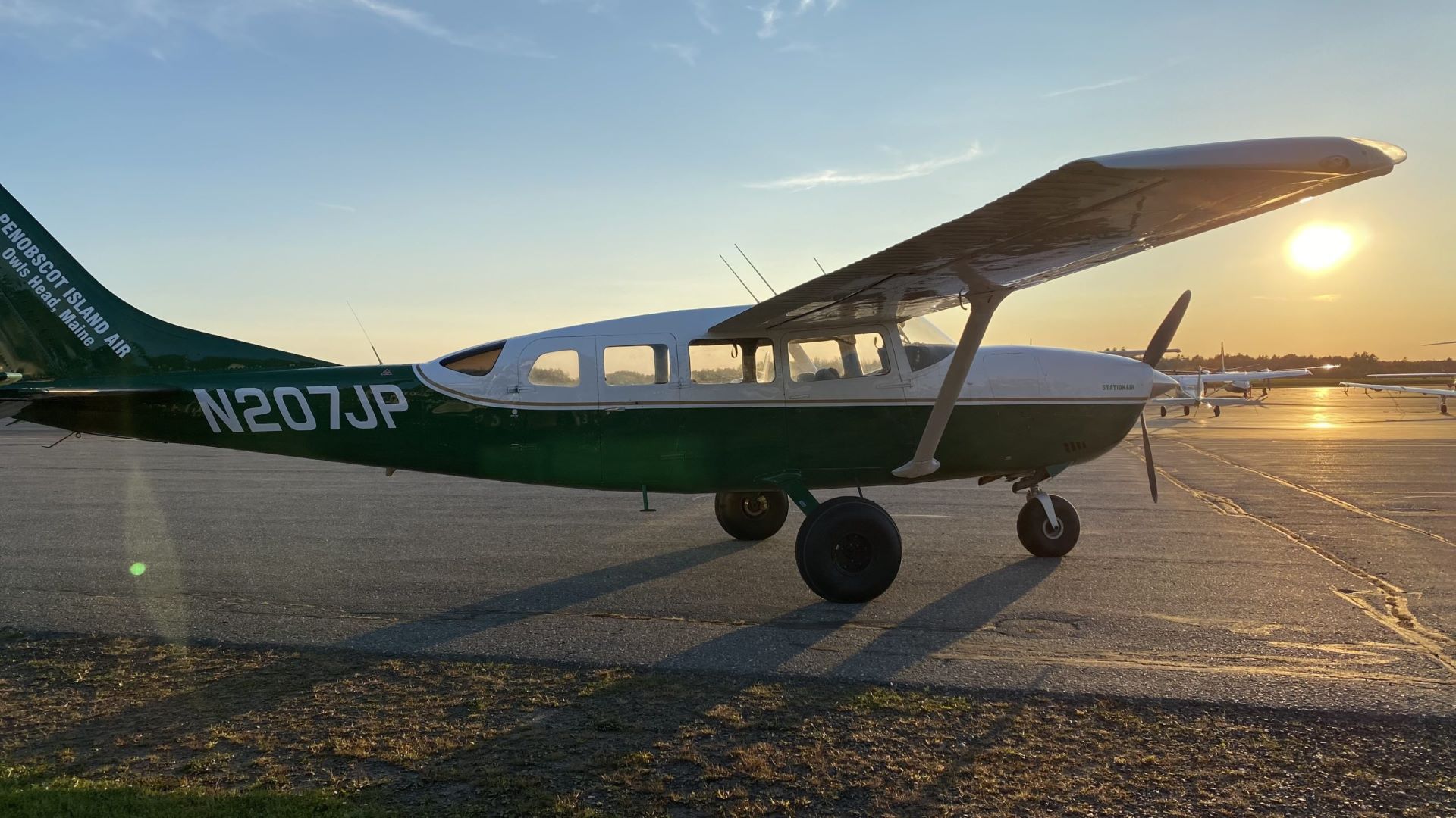 A plane owned by Penobscot Island Air on the tarmac.