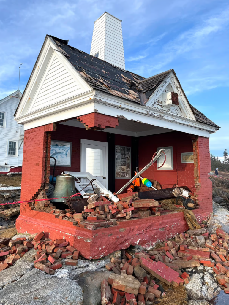 Two of the four brick walls of the lighthouse are missing due to storm damage