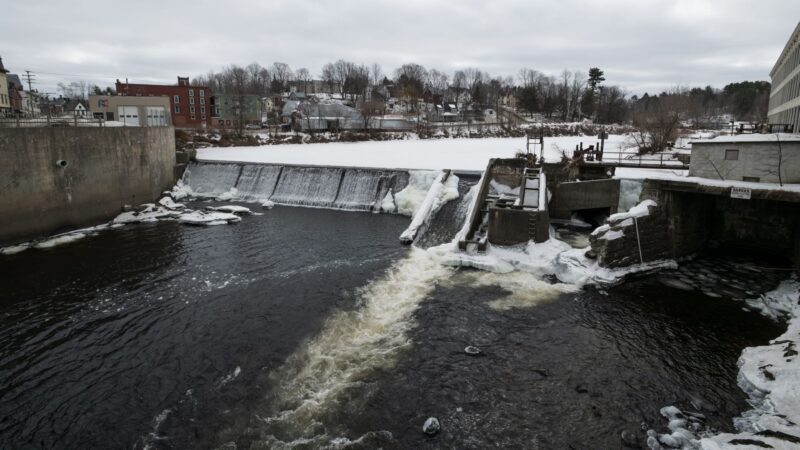 Water flows over the dam in Dover-Foxcroft.