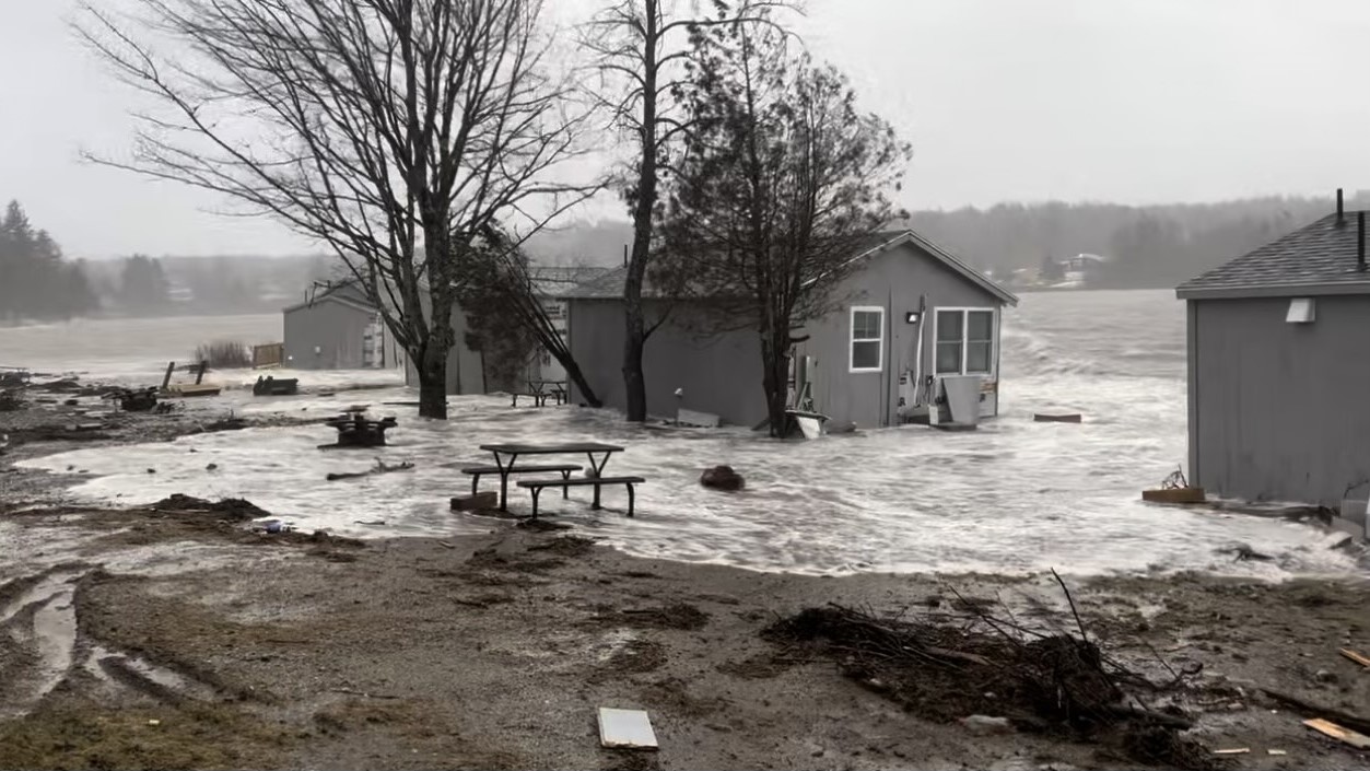 Water surrounds coastal cottages