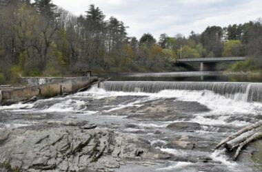 Water flows at the Bridge Street Dam in Yarmouth, Maine.