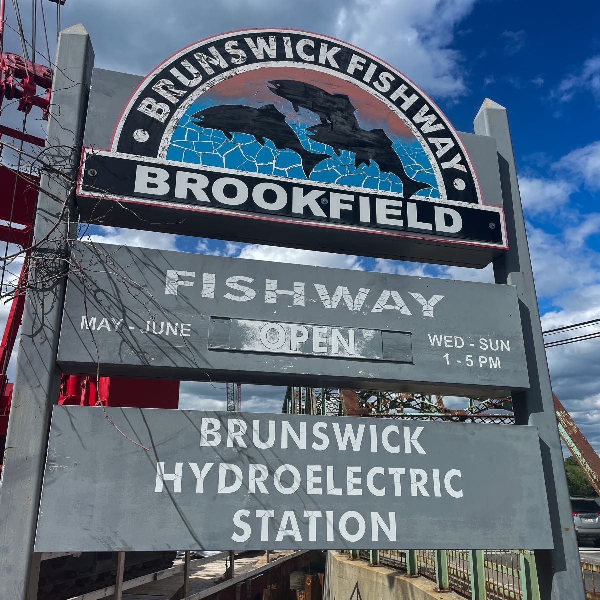 A sign that denotes the fishway is open for visitors.