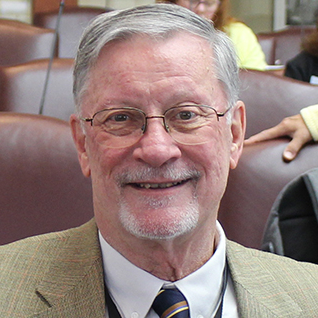 headshot of James Mark Worth.