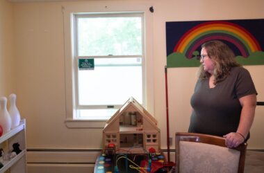 Katie Sell standing in a room.