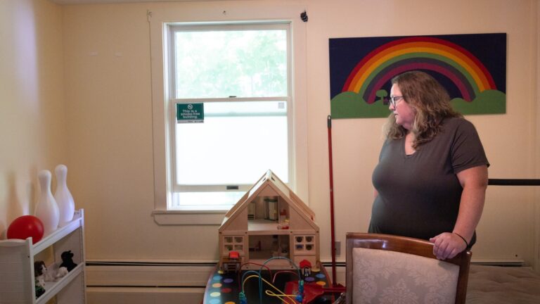 Katie Sell standing in a room.