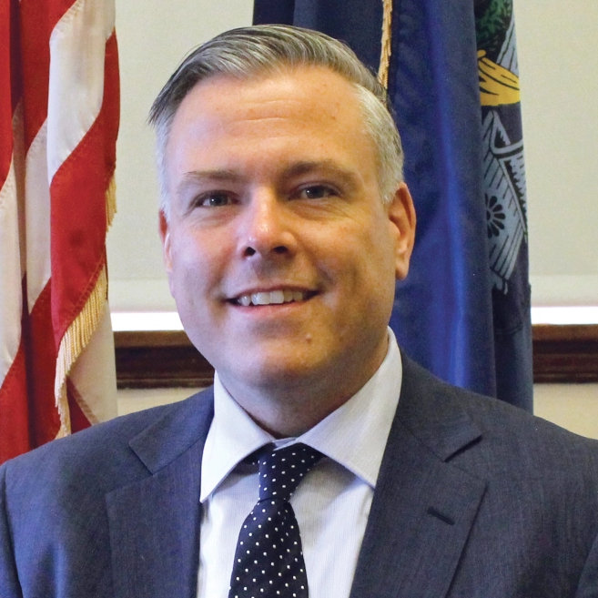 headshot of Matthew Harrington.