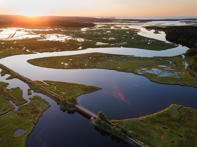 An aerial photo of the Scarborough marsh at sunrise.