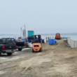 Construction crew at work on rebuilding the pier at Chipman's Wharf.