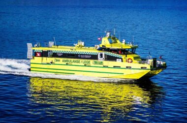 An ambulance vessel travels across the water.