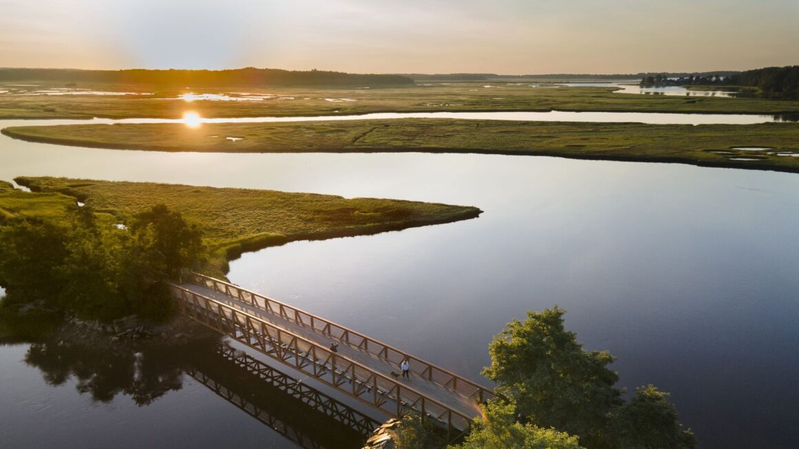 An aerial photo of a bridge across the Scarborough marsh.