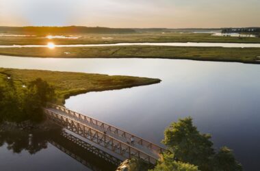 An aerial photo of a bridge across the Scarborough marsh.