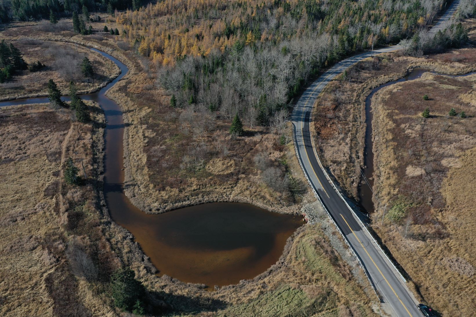 An aerial photo of Addison Road crossing Bells Brook.