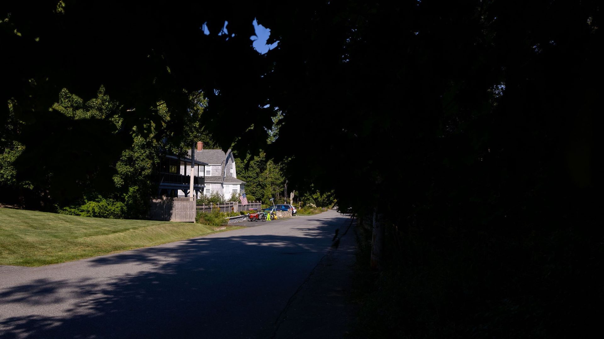 A child's play area in the driveway of a home.