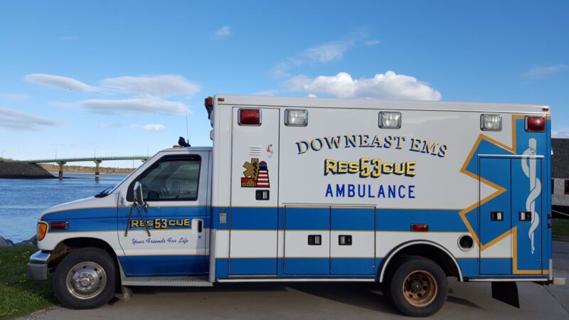 A white and blue Downeast EMS ambulance.