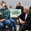 A group of people attend a hearing in Bucksport.