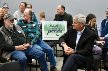 A group of people attend a hearing in Bucksport.