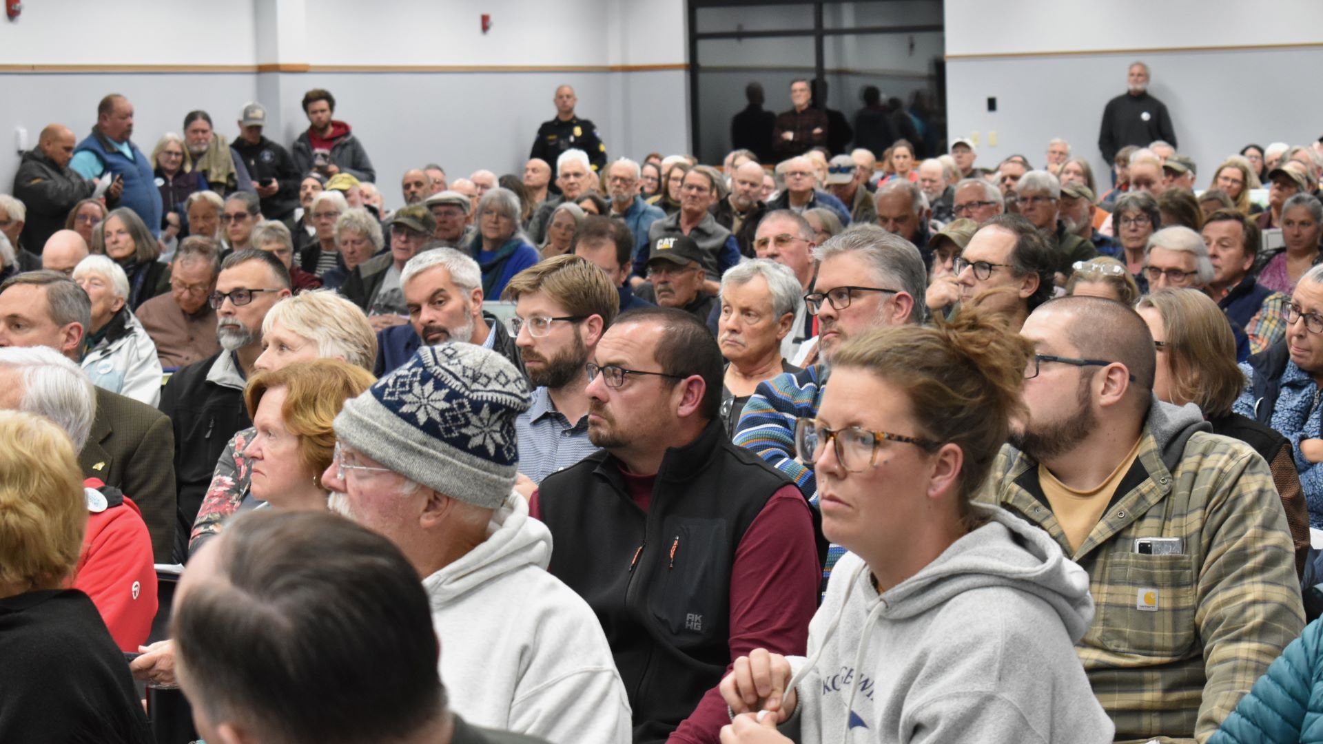 a large group of people attend a hearing in Bucksport.