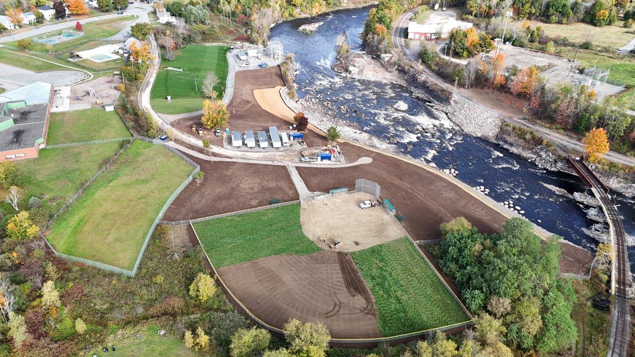 aerial view of the milltown dam area and the buildings around it.