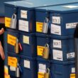 a stack of secured ballot boxes.