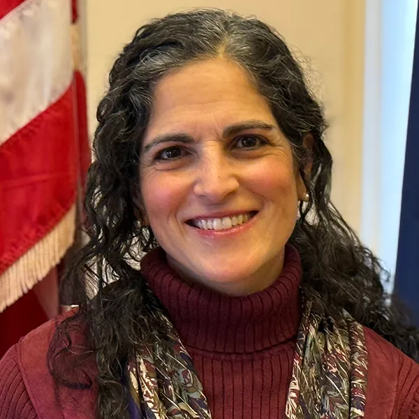 headshot of Elizabeth Caruso.