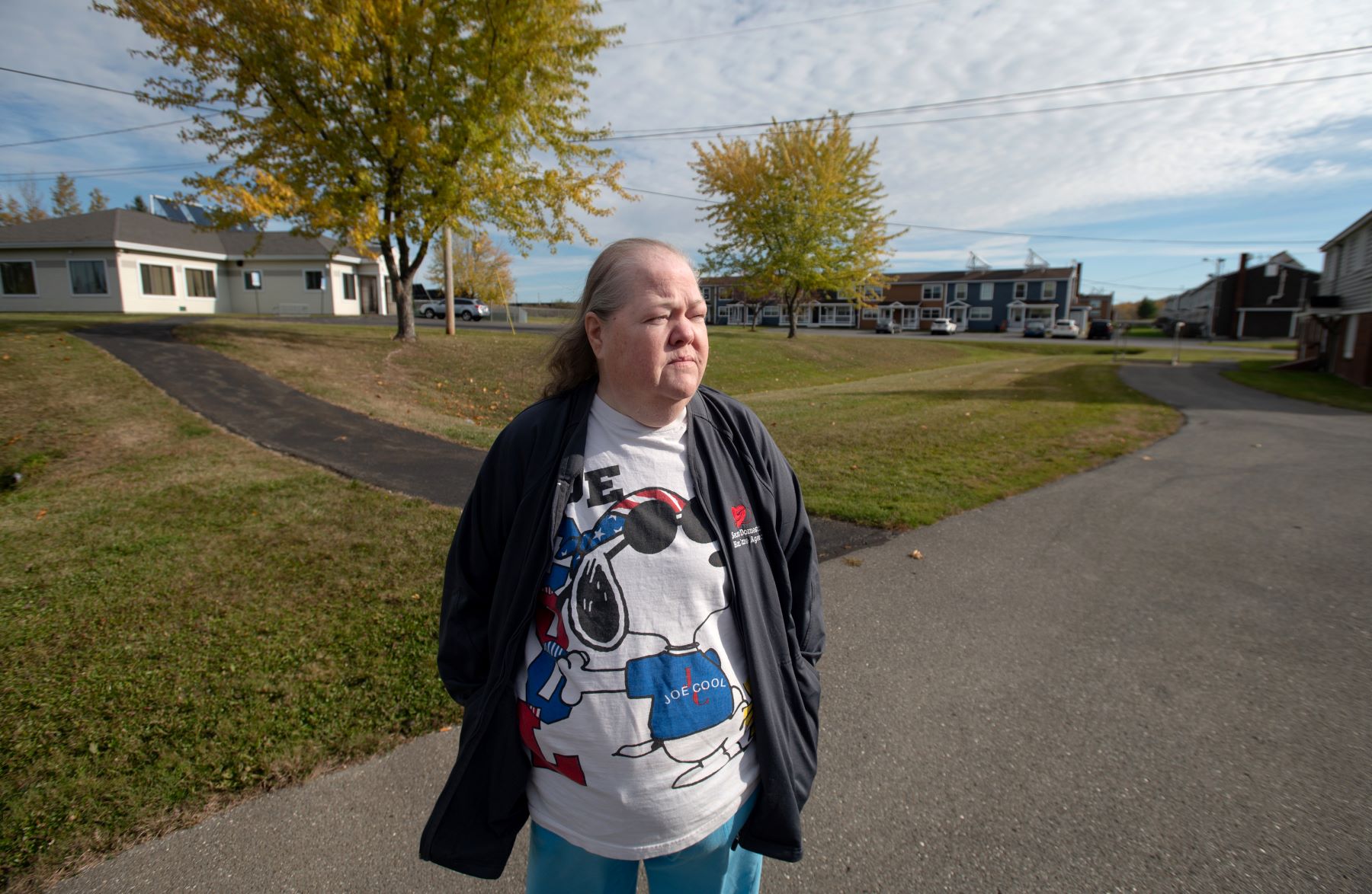 Linda Gallagher Garcia poses for a photo on the street.