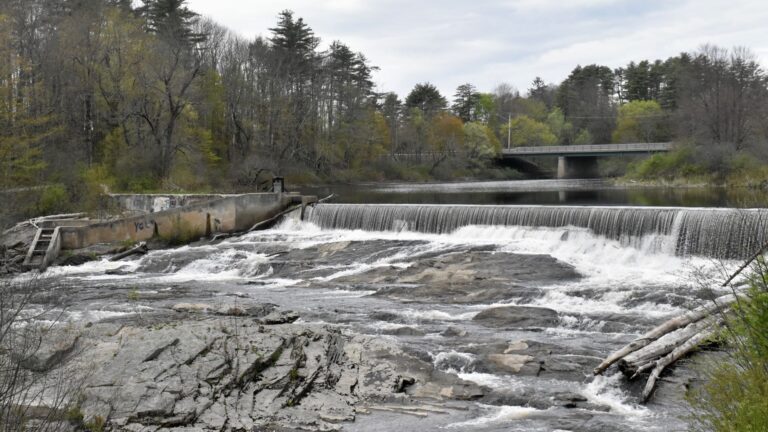 Water flows at the Bridge Street Dam in Yarmouth, Maine.