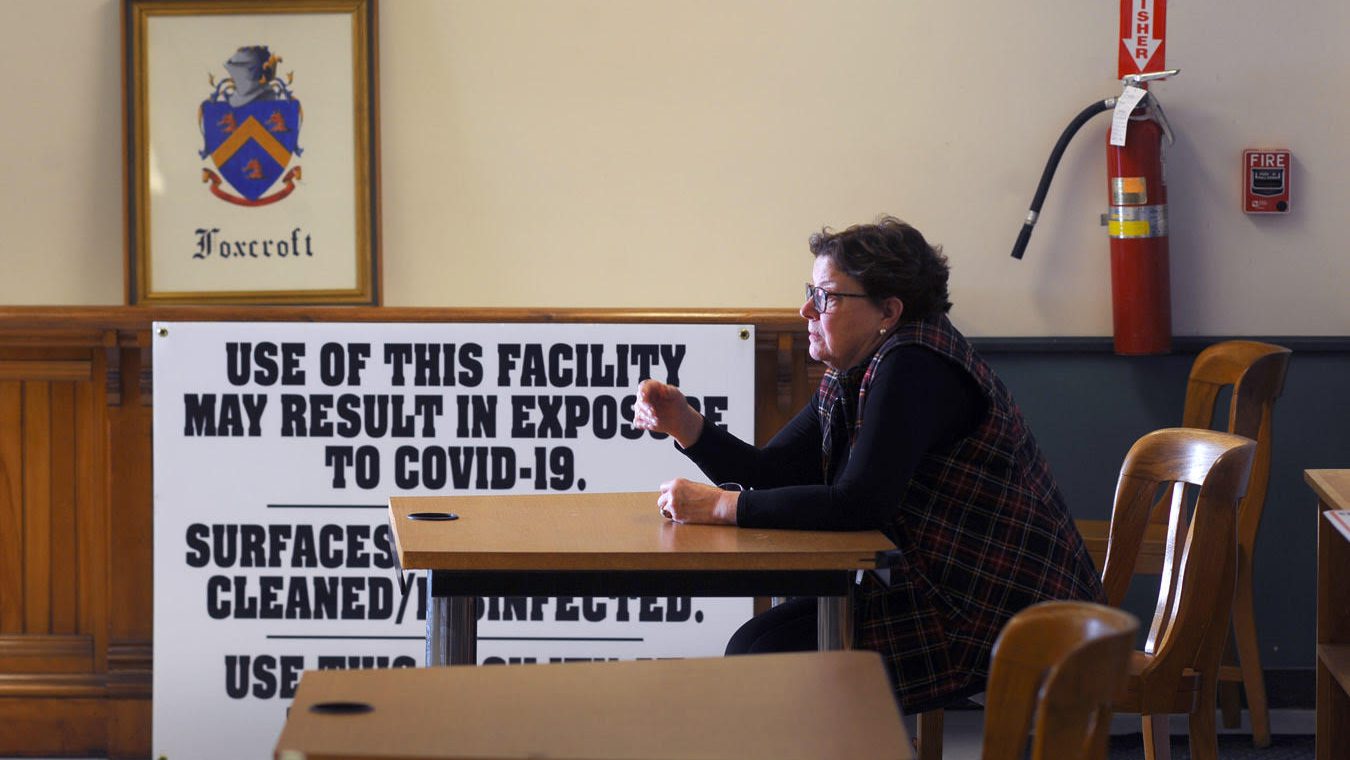 Sue Mackey Andrews talks during a municipal meeting.