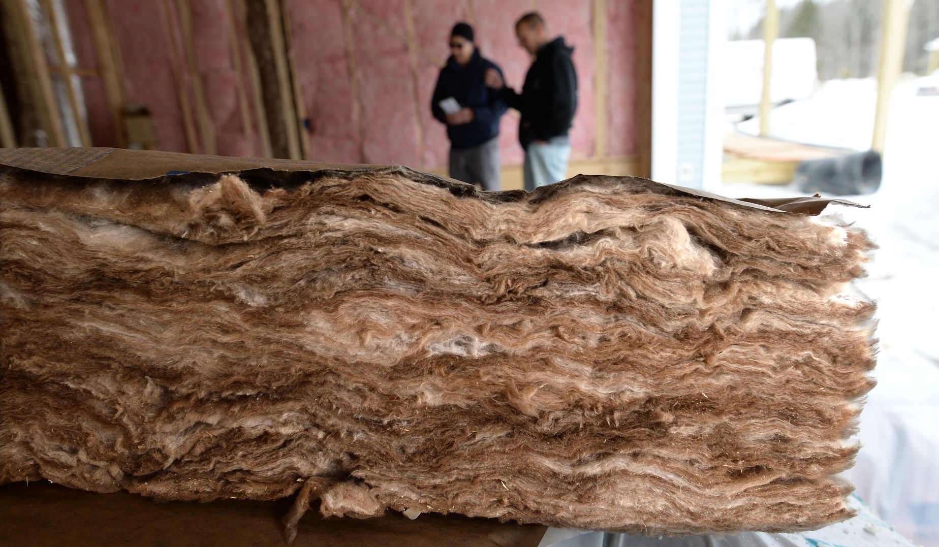 insulation piles seen at a construction site.