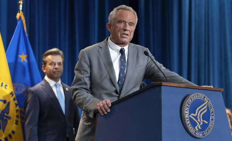 Robert F. Kennedy Jr speaks at a podium.