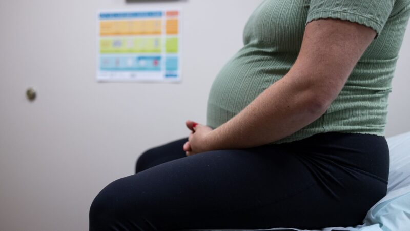 a pregnant woman at a medical appointment.